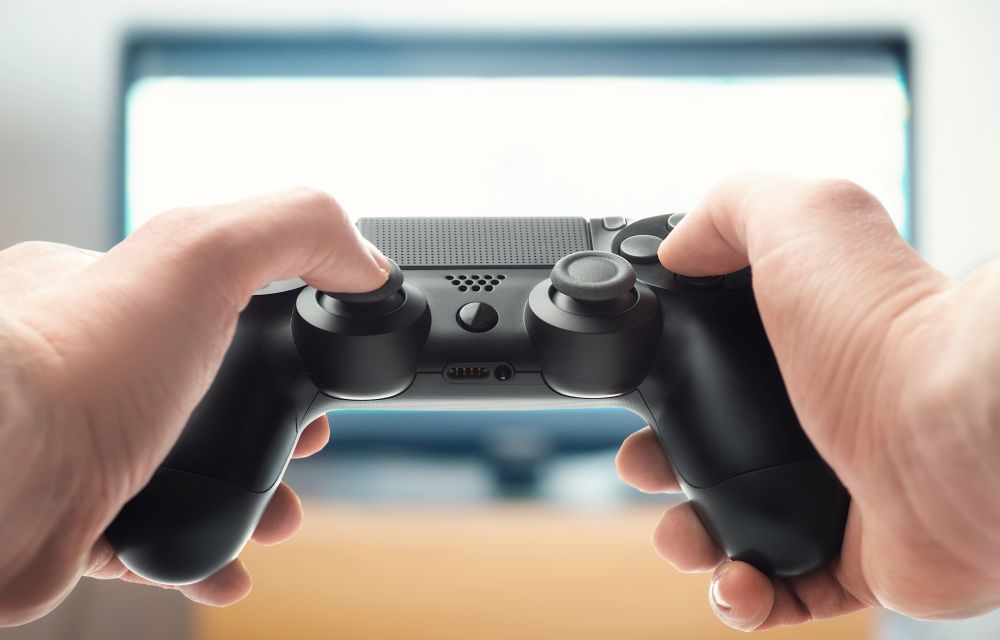 Hands with a gamepad (first person view)